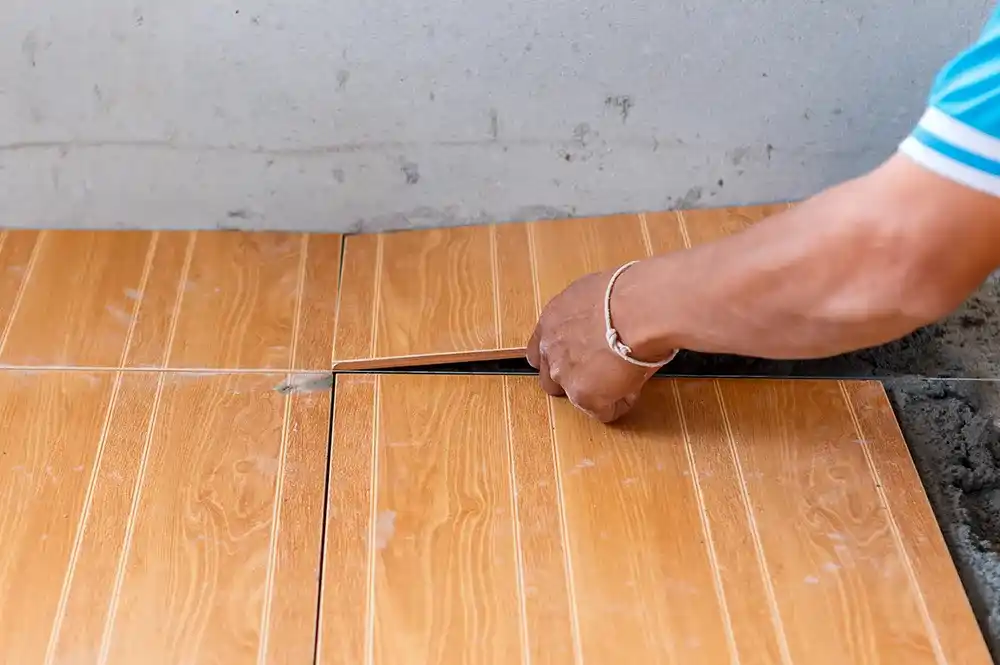 High-Quality Tile Flooring for a Sleek and Durable Look Tile floor installation with precise alignment and clean finishing